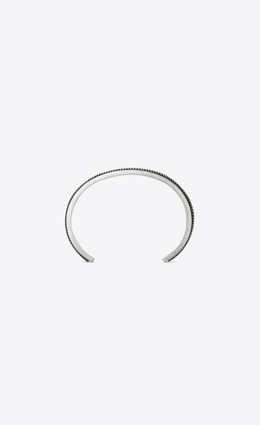Folk cuff bracelet in metal with two twists